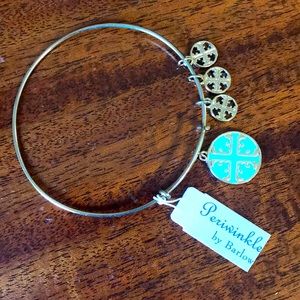 Periwinkle by Barlow, charm bracelet with Tory Burch charms.